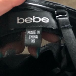 X small Bebe jumpsuit.